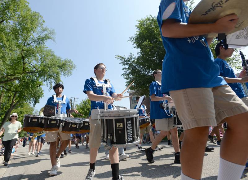 Members of  the Hinsdale Central marching band participate in the 4th of July parade Tuesday June 4, 2023.