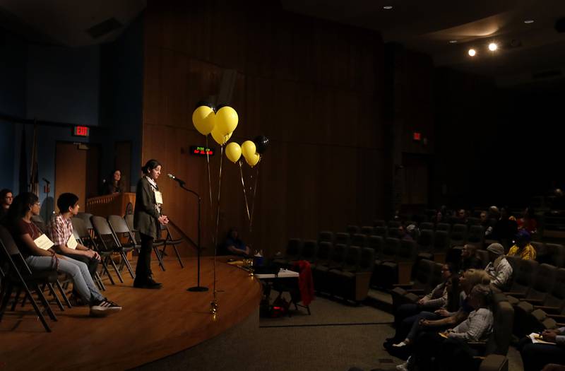 Poornika Nag of Lundahl Middle School in Crystal Lake spells a word on her way to finishing in third place in the McHenry County Regional Office of Education's 2023 spelling bee on Wednesday, March 22, 2023, at McHenry County College's Luecht Auditorium in Crystal Lake.