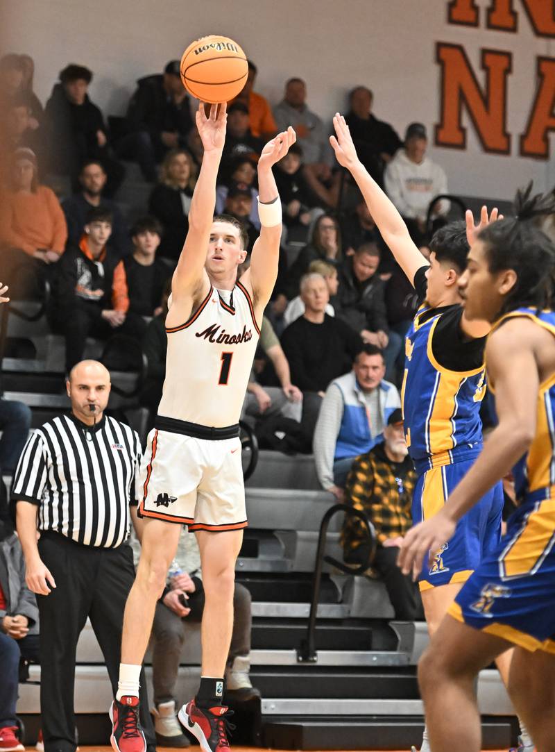 Minooka's Jaden Boe (1) shoots a 3 point shot during a conference game against Joliet Central on Friday, Jan. 10, 2025, at Minooka.
