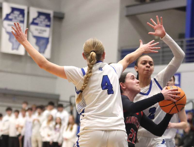 Huntley’s Luca Garlin squeezes through defenders under the hoop in varsity girls basketball on Monday, Feb. 9, 2026, at Central High School in Burlington.