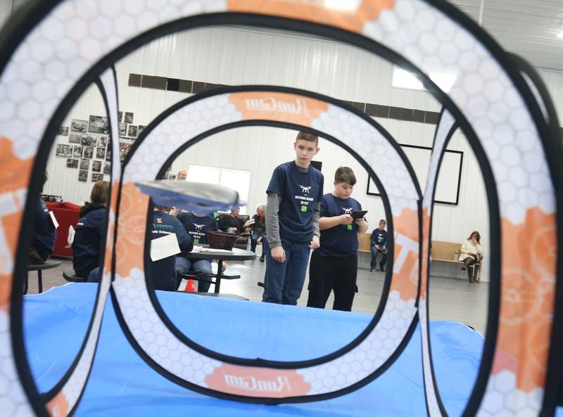 Ryder Baugh of Washburn and Grant Hardy of Princeton, fly their drone through obstacles during a drone competition on Saturday, Nov. 22, 2025 at the Second Story Teen Center in Princeton. Teams from Bureau, La Salle and Marshall-Putnam counties came together to showcase their flying skills during the event. Second Story Teen Center partnered with the University of Illinois Extension of Bureau, La Salle Marshall and Putnam Counties. Drones and awards were purchased through a grant and donations from Compeer Financial.