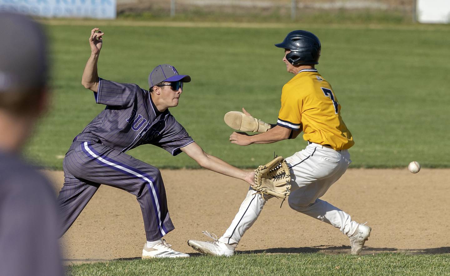 Dixon’s Kellen Haenitsch and Sterling’s Landon Kukowski collide on a play at second Friday, May 23, 2025. Neither were injured.