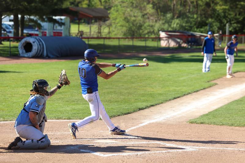Clifton Central's Mayson Mitchell connects for a hit during Central's 8-4 victory over Kankakee on Monday, May 11, 2026.