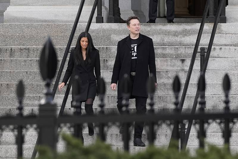 Elon Musk walks down the stairs from the Eisenhower Executive Office Building on the White House campus, Thursday, Feb. 13, 2025, in Washington. (Photo/Alex Brandon)