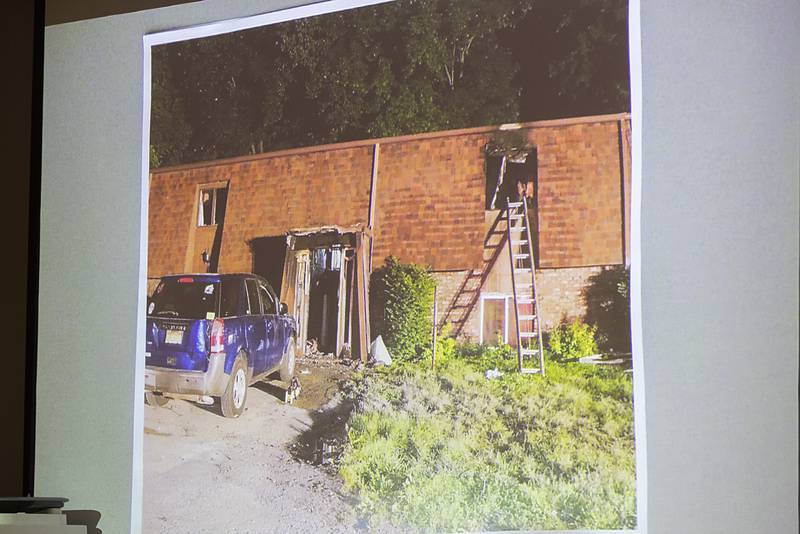 A picture of the Western Apartments is shown in court Thursday, July 18, 2024, at the trial of Steven W. Coleman. Coleman is accused of setting fire to the complex, resulting in the deaths of three people.