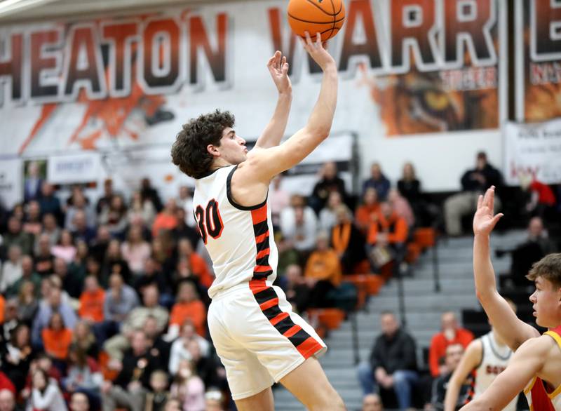 Wheaton Warrenville South's Luca Carbonaro shoots three points during a game against Batavia on Friday, Feb. 14, 2025 in Wheaton.