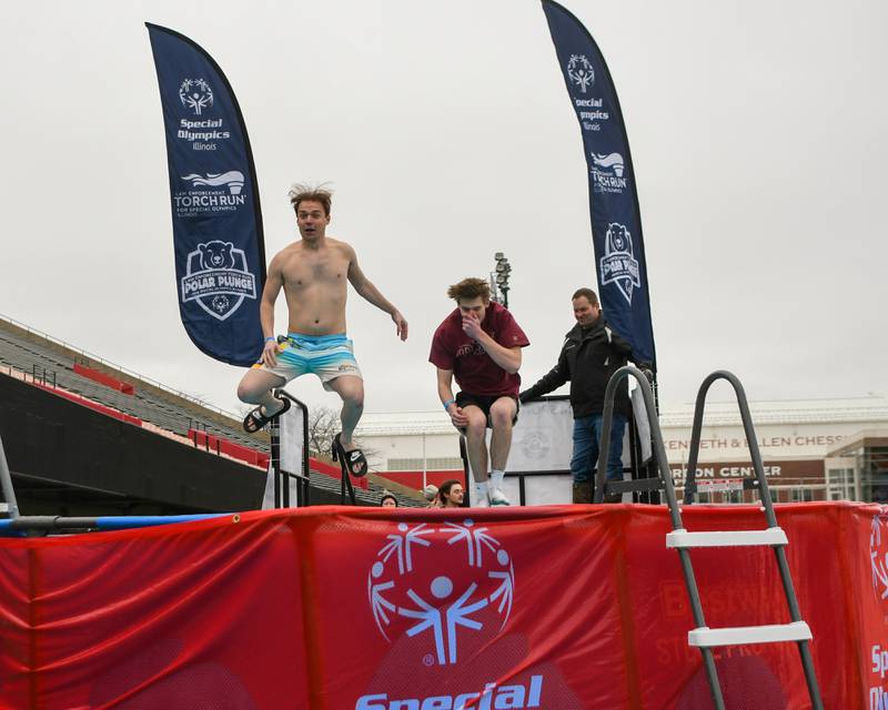 Participants take the plunge during the Polar Plunge event on Saturday Feb. 21, 2026, held at Huskie Stadium in DeKalb.