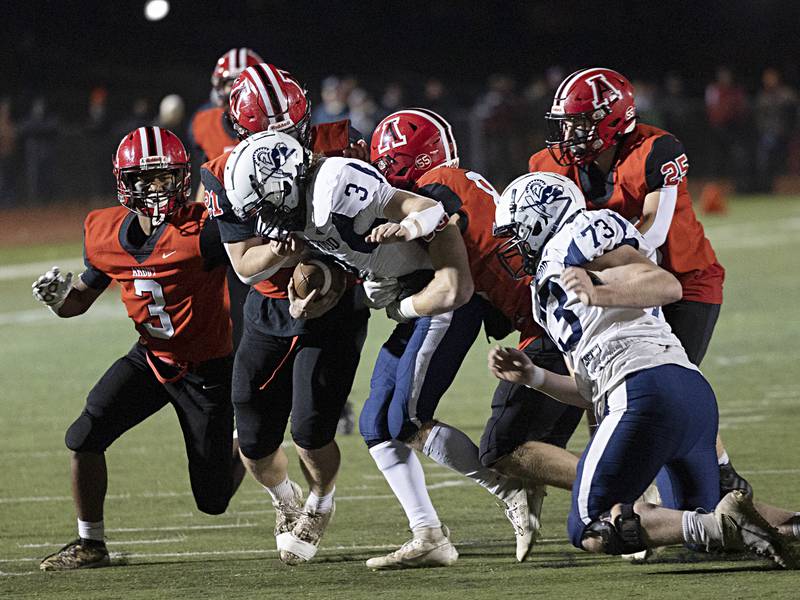 Ridgewood’s Ryle Catour fight for yards against the Amboy defense during the I8FA championship Friday, Nov.17, 2023 at Monmouth College