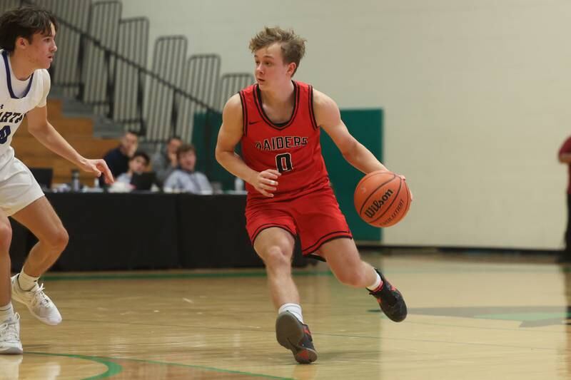 Bolingbrook’s Trey Brost looks for a play against St. Francis in the Jack Tosh 2023 Holiday Classic on Wednesday, Dec.27th, 2023 in York.