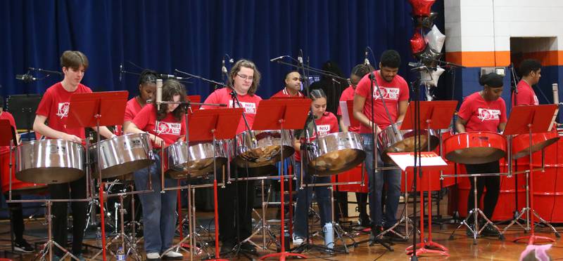 Members of the Northern Illinois University Steelband performs for students on Friday, Feb. 14, 2025 at DePue School. The band was created in 1973. The NUU Steelband band brings versatility and profundity of the steelpan, the national instrument of Trinidad and Tobago. Most of the students in the band are from Trinidad and Tobago, Belize Antigua and Barbuda. The NIU Steelband is the first active steelband formed at an American university. NIU is also one of the few institutions in the world at which students may pursue undergraduate and graduate music degrees with the steelpan as the major instrument of choice. Funding for the NIU Steelband visit to DePue was provided in part by the Starved Rock Country Community Foundation, Illinois Arts Counci and National Endowment for the Arts.