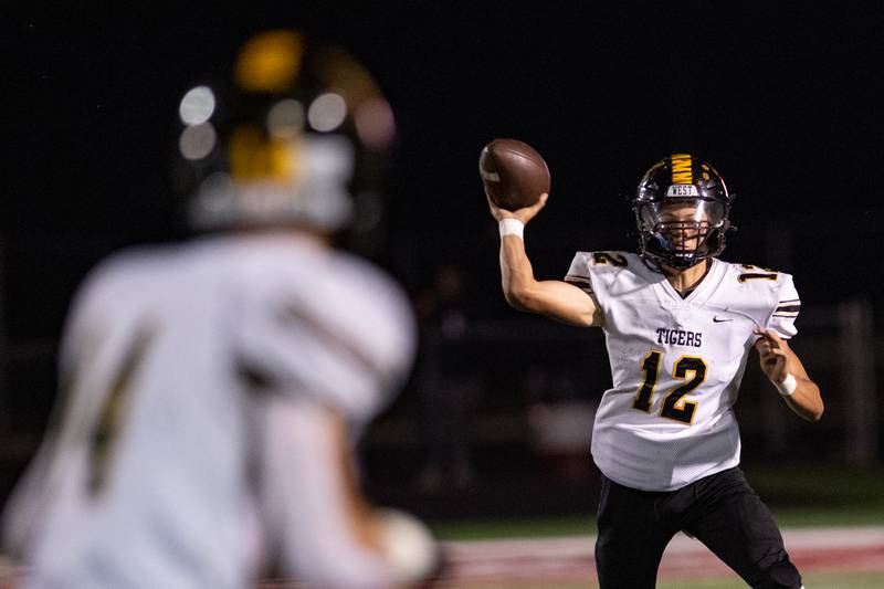 Joliet West's Antoine Brooks  throws to Payton Turner during a game against Plainfield North Friday Sept. 20, 2024 at Plainfield North High School