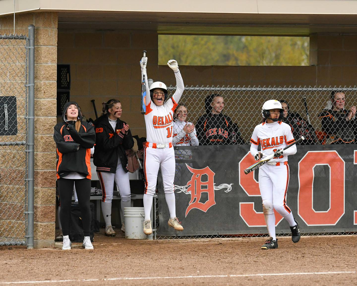 DeKalb Izzy Aranda (17) jumps for joy after teammate Lauren Gates gets a base hit on Saturday April 29th while taking on Kaneland at DeKalb High School.