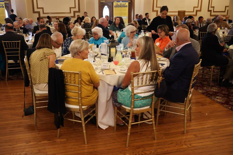 The Women of Rotary, sitting together, were honored at a luncheon to celebrate the 110th anniversary of the Rotary Club at Jacob Henry Mansion on Tuesday, Aug. 1 in Joliet.