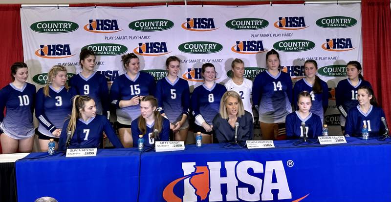 Members of the Nazareth Academy volleyball team are interviewed by the media after defeating Taylorville in the Class 3A semifinal game on Friday, Nov. 11, 2022 at Redbird Arena in Normal.