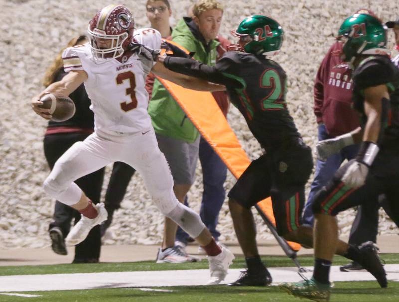 Morris's Sam Reddinger runs the ball down the field and out of bounce near the endzone past L-P's Ethan Bell (no,24) on Friday Oct. 15, 2021.