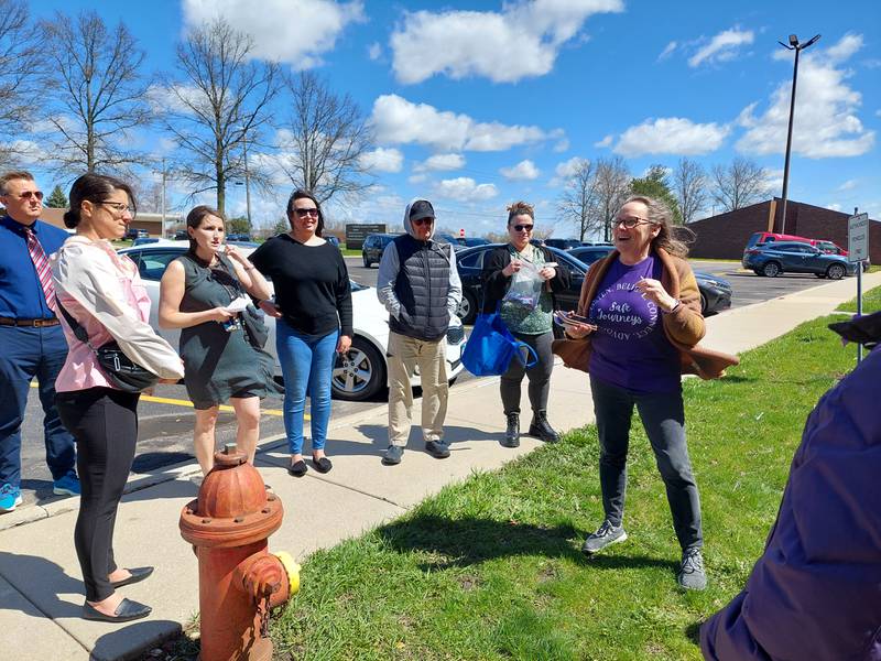 Susan Bursztynsky, the executive director of Safe Journeys, talks about advocating for victims of sexual and domestic violence on Friday, April 12, 2024, during a rally in front of the La Salle County Courthouse on Etna Road in Ottawa.
