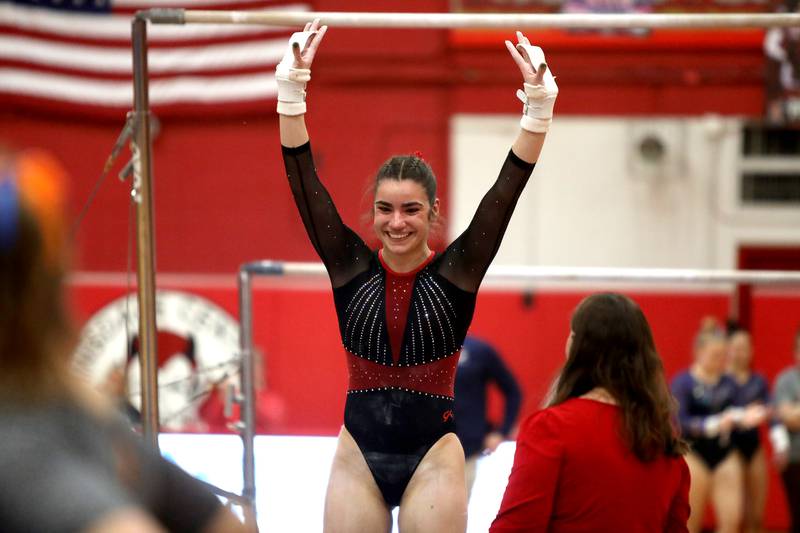 Hinsdale Central’s Erica Driscoll competes on the uneven bars during the Hinsdale Central Sectional on Monday, Feb. 10, 2025 in Hinsdale.
