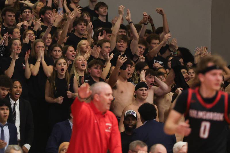 Benet fans celebrates as the Redwings extend their lead in the final minutes against Bolingbrook in the Class 4A Bolingbrook Sectional championship game on Friday, March 6, 2026 in Bolingbrook.