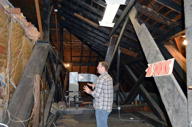 John Russell, of rural Mt. Morris, describes the 1931 fire that damaged the former Kable News Company building — then the Mount Morris College's College Hall — during an April 20, 2023, interview with Shaw Media. Russell closed on his purchase of the historic building on March 1; he plans to restore and modify it into multi-use space that benefits the community.