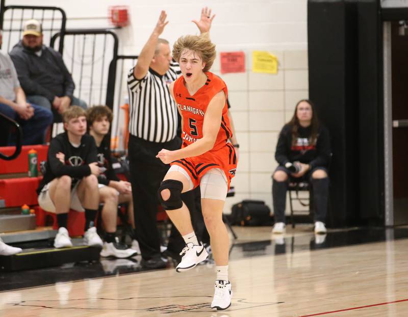 Flanagan-Cornell's Mason Rich reacts after hitting a three-point basket over Woodland early on in the game during the Route 17 Classic Tournament on Wednesday, Nov. 27, 2024 at Woodland High School.