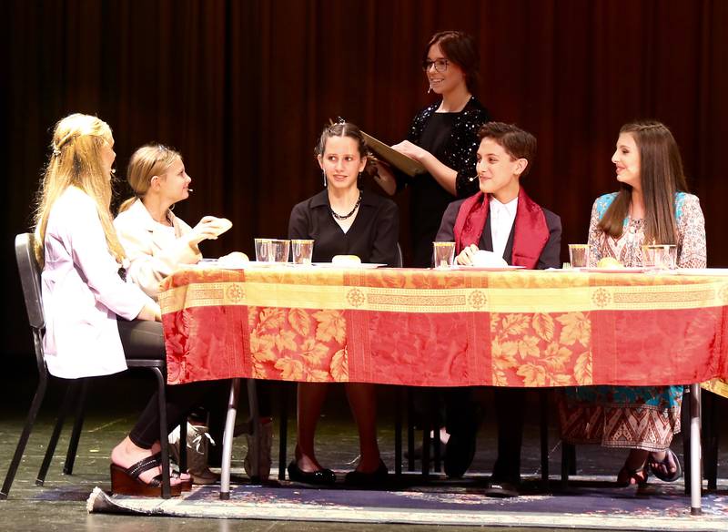 (l-r) Keegan Kragt, Ashtyn Ruh, Sydney Konen, Charlie Placzek, Derin Cakmak and Rocklyn Sabathne perform in Kaneland Harter Middle School’s production of “How to Host a Murder Mystery Dinner Party (In 15 Simple Steps)” on Saturday, Oct. 15, 2022 in Sugar Grove.