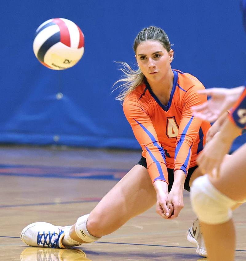 Genoa-Kingston's Hannah Langton receives a serve during their match against Montini Tuesday, Sep. 5, 2023, at Genoa-Kingston High School.
