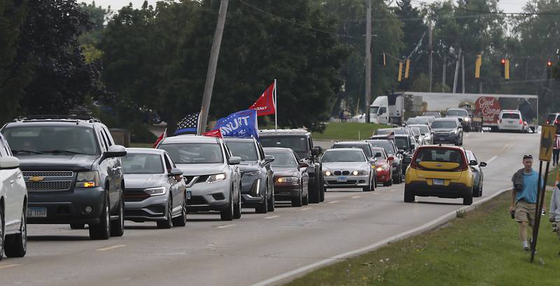 Traffic on Country Club Road are shown on the way to the Trump Now-Save the American Dream Rally at the McHenry County Fairgrounds on Sunday Aug. 18, 2024, in Woodstock.