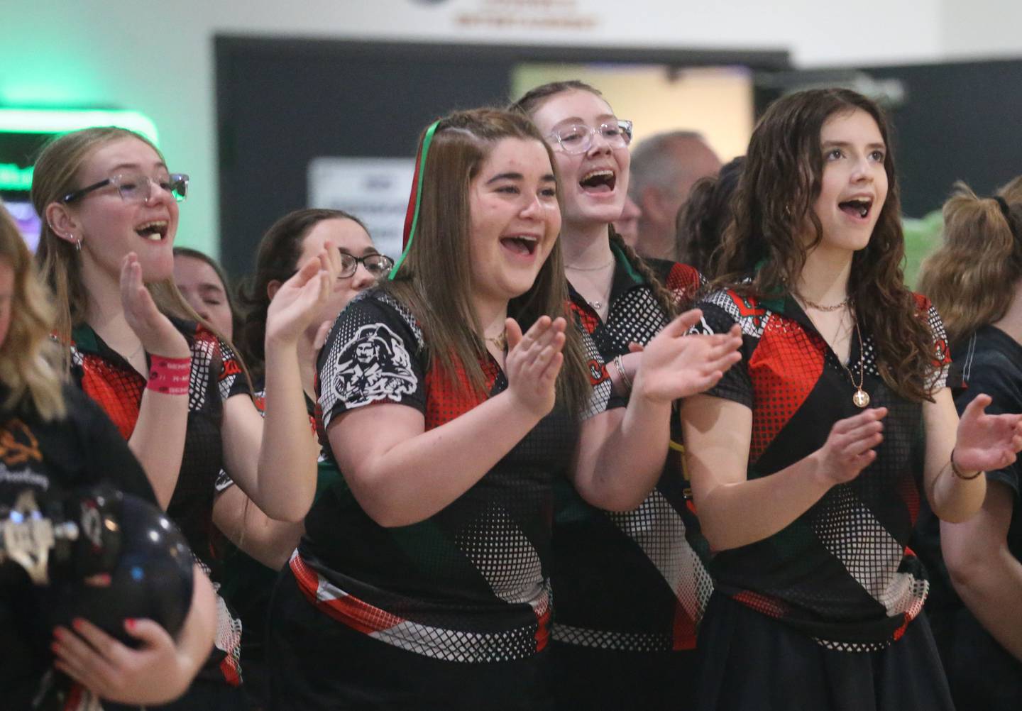 L-P's girls bowling team members (from left) Kailey Harper, Kamryn Oscepinski, Leah Ricci and Evelyn Milton cheer on the Lady Cavs bowling team during the IHSA girls bowling Regional meet on Friday, Feb. 6, 2026 at the Illinois Valley Super Bowl in Peru.