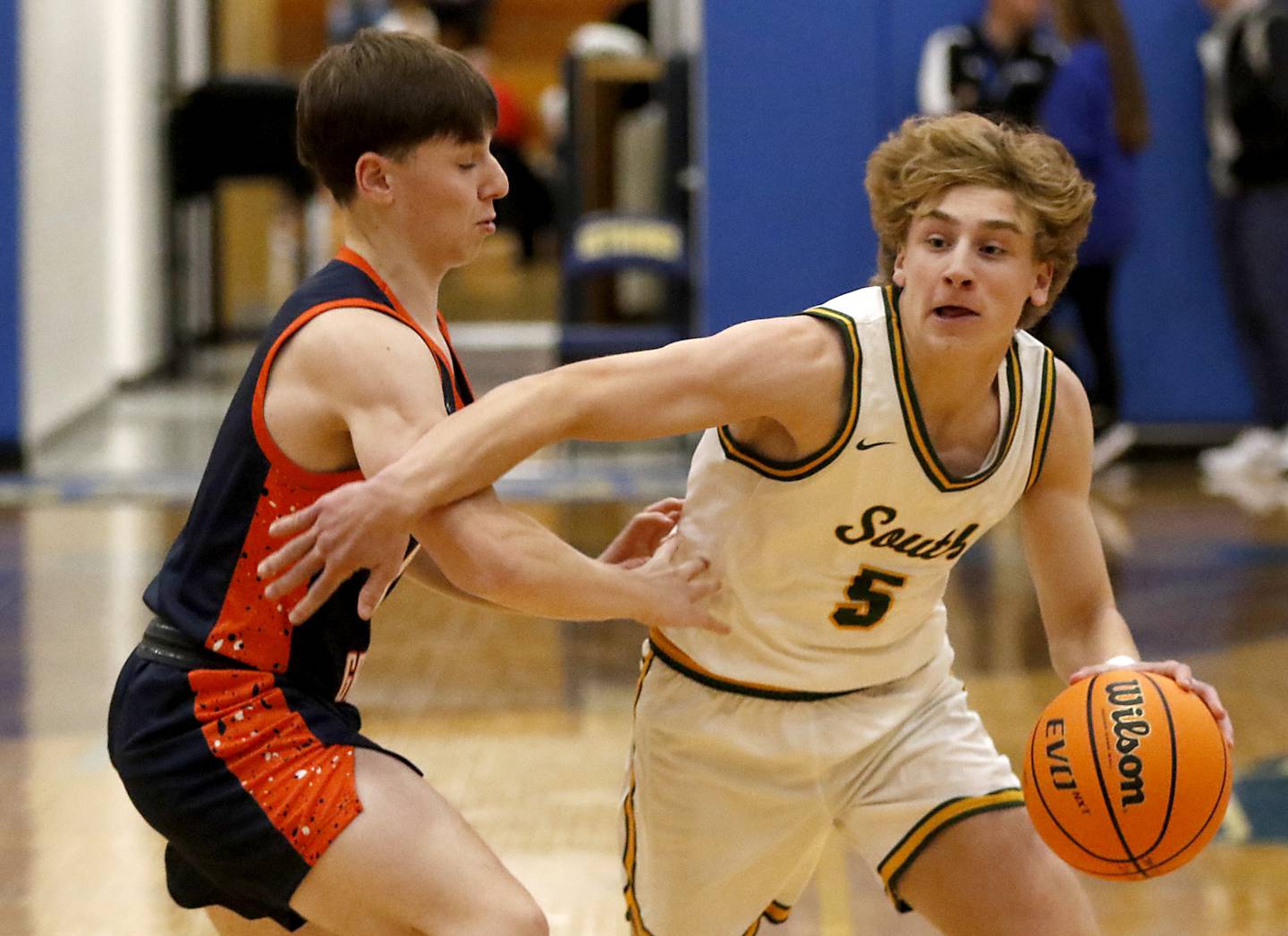 Crystal Lake South's Carson Trivellini drives to the basket against Buffalo Grove's Payton Kosnoff during a Johnsburg Thanksgiving Tournament boys basketball game on Monday, Nov. 25, 2024, at Johnsburg High School.