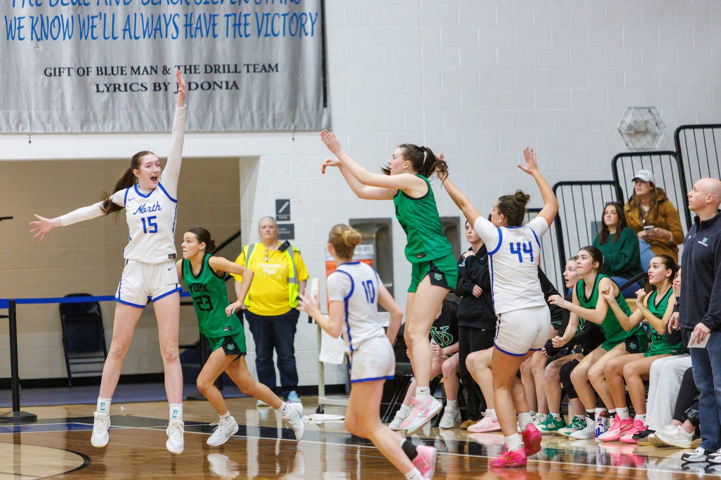 York's Avery Larma shoots a game tying three pointer at the end of the 4th quarter at the Class 4A Regional Final on Thursday, Feb.19,2026 in St. Charles.