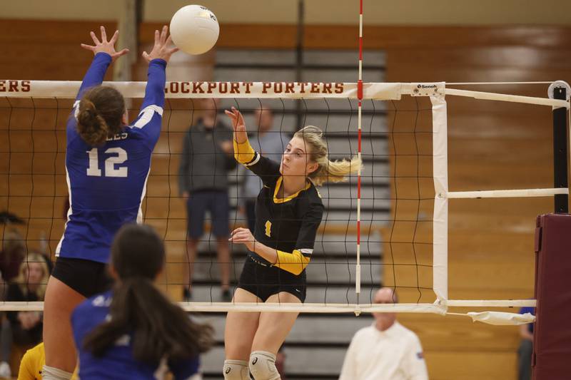 Joliet West’s Ava Grevengoed hits a shot past the defense of Sandburg in the in the Class 4A Lockport Sectional title match on Wednesday.