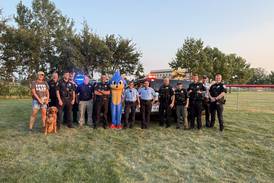 Yorkville police therapy dog Eli meets Sonic the Hedgehog at National Night Out 