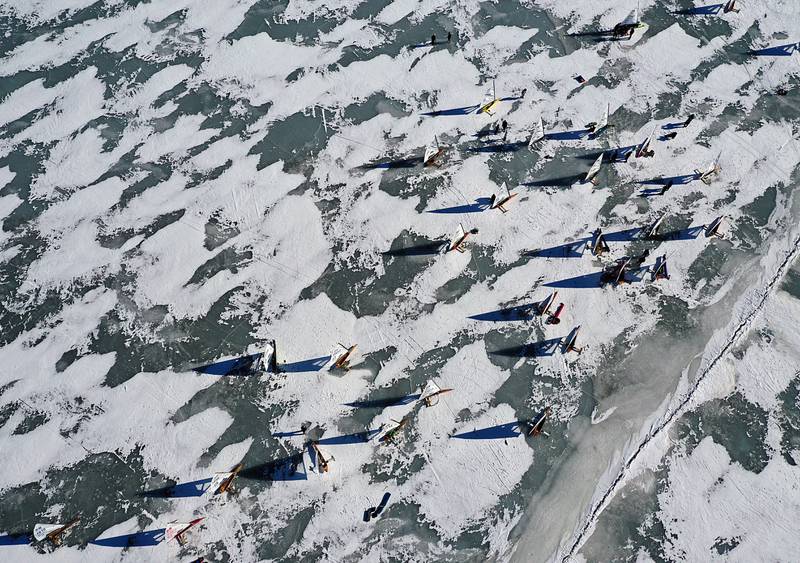 Here, an aerial view of the ice boats prepare to race each other during the 2022 US National DN Ice Boat racing on Senachwine Lake on Wednesday Jan. 26, 2022 near Putnam.