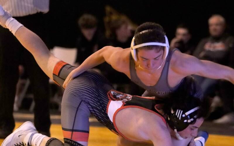 Jacobs’ Asher Bonilla, top, battles Crystal Lake Central’s Daniel Snow at 132 pounds in varsity wrestling on Thursday, Jan. 16, 2025, at Jacobs High School in Algonquin.