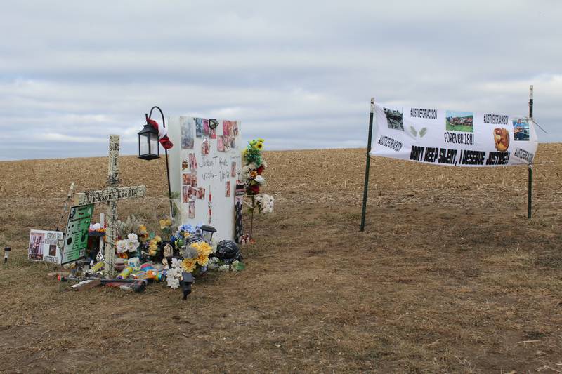 A memorial for Jackson Kradle sits along state Route 78, Jan. 16, 2025, on the north edge of Mount Carroll.