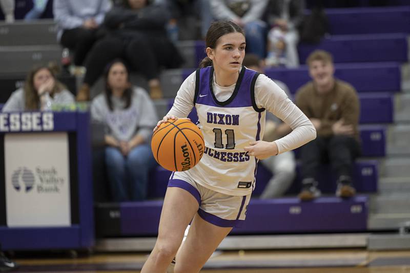 Dixon’s Kiley Gaither handles the ball against Byron Saturday, Dec. 27, at the Duchesses Basketball Christmas Classic.