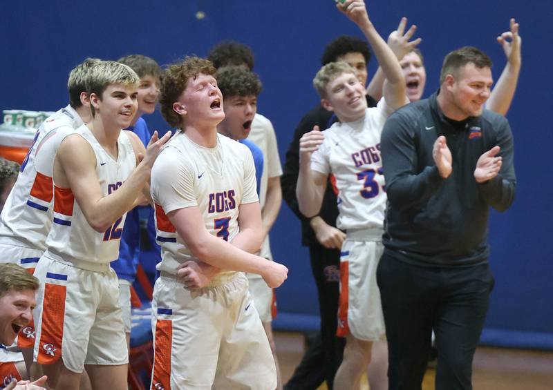 The Genoa-Kingston bench celebrates as North Boone calls a timeout during their Class 2A regional game Monday, Feb. 24, 2025, at Genoa-Kingston High School.