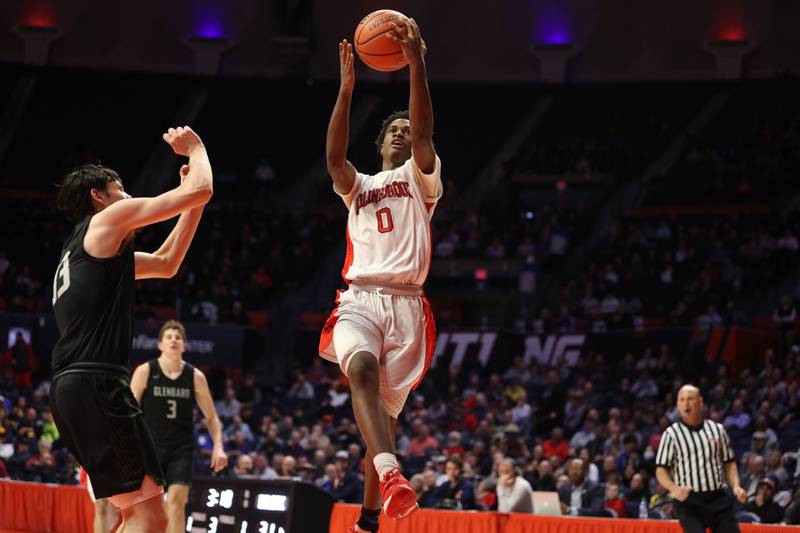 Bolingbrook’s Mekhi Cooper goes in for the basket against Glenbard West in the Class 4A semifinal at State Farm Center in Champaign. Friday, Mar. 11, 2022, in Champaign.