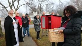 Little free library dedicated at St. Paul's Episcopal Church in DeKalb