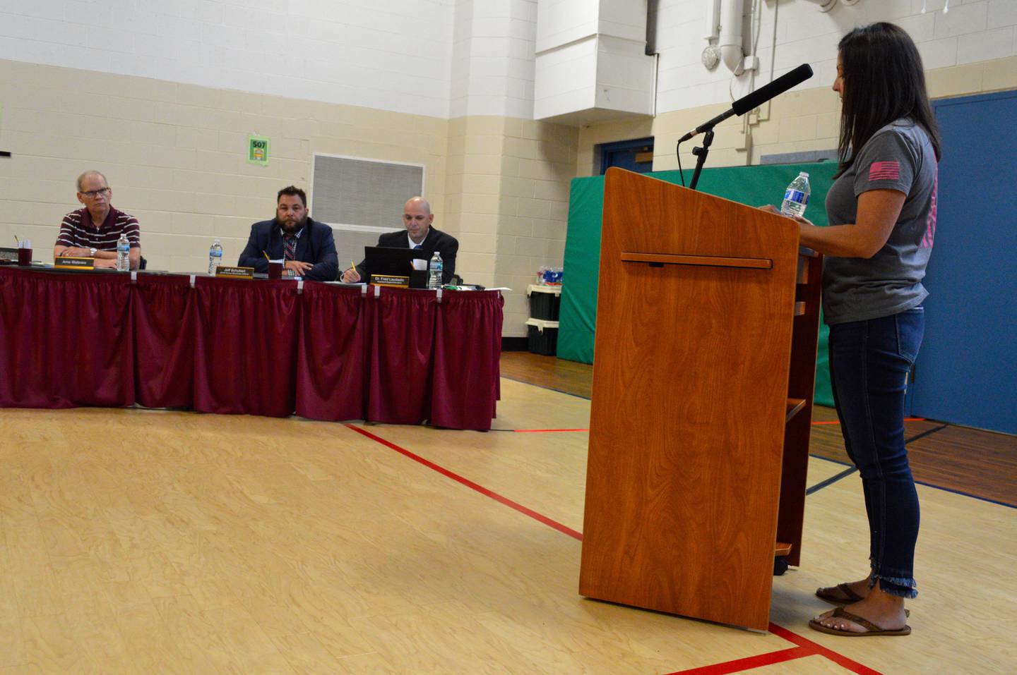 Tami Hacker, of McHenry, urges McHenry Elementary School District 15 officials to make masks optional for both students who have been vaccinated against COVID-19 and those who are unvaccinated Wednesday, July 14, 2021.