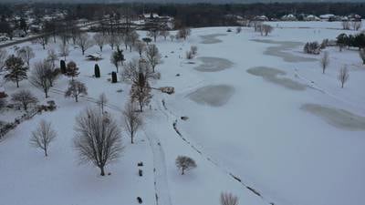 Photos: Baker Lake walking path complete but remains closed admist snowfall