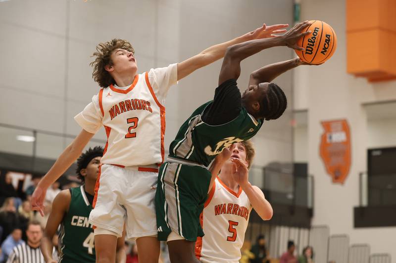 Plainfield Central’s Stephon Griffin makes a near impossible shot against Lincoln-Way West’s Aidan Bach on Saturday, Jan 3, 2026 in New Lenox.