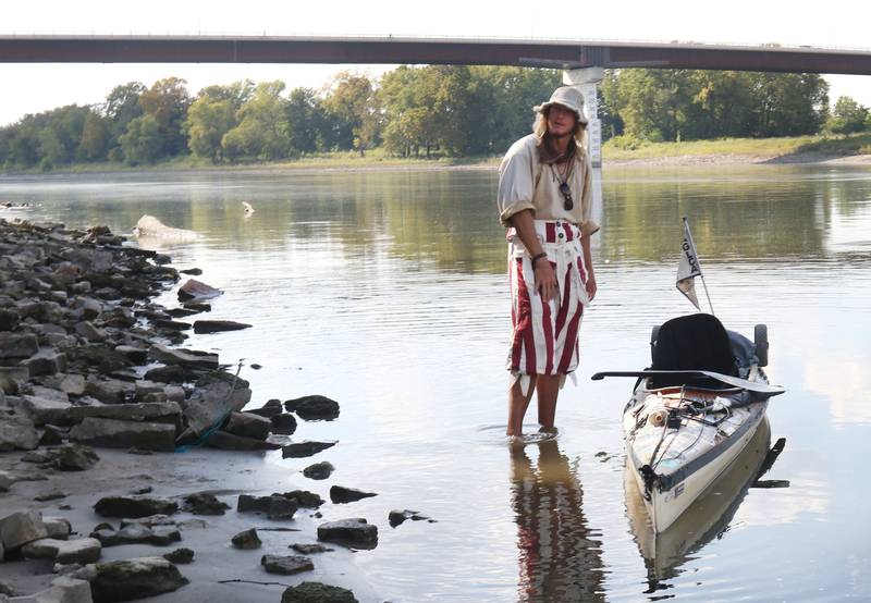 Peter Frank of Escanaba, Michigan, poses next to his Kayak along the Illinois River at Starved Rock State Park on Thursday, Sept. 11, 2025. Frank left Escanaba, Mich., on June 27, 2024. Frank has logged nearly 450 days and over 4,400 miles while navigating the American Great Loop in reverse.
