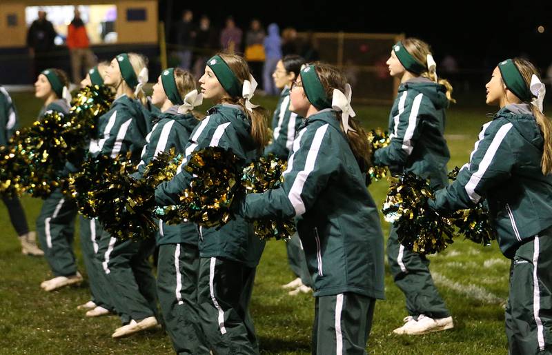 St. Bede cheerleaders perform on the sidelines while playing Marquette on Friday, Oct. 13, 2023 at Gould Stadium.