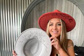 Johnsburg artist crafts fanciful hats in honor of late mom