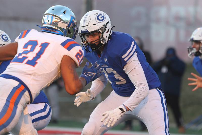 Geneva’s William Anthony looks to block against East St. Louis in the Class 6A state championship on Saturday, Nov. 30, 2024 in Normal.