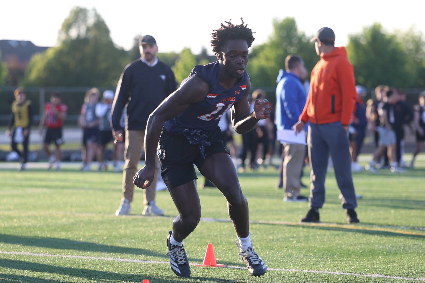 Oswego’s Ammar Banire runs a cone drill at the IHSA Southwest Suburb Showcase combine on Thursday, May 7, 2026 at Plainfield North High School.