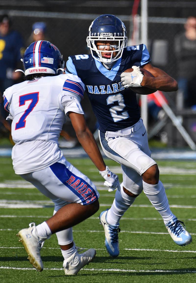 Nazareth's Garrett Reese (2) tries to get past Glenbard South's Justin Jones (7) during a Class 5A second round game on Nov. 4, 2023 at Nazareth Academy in LaGrange Park.