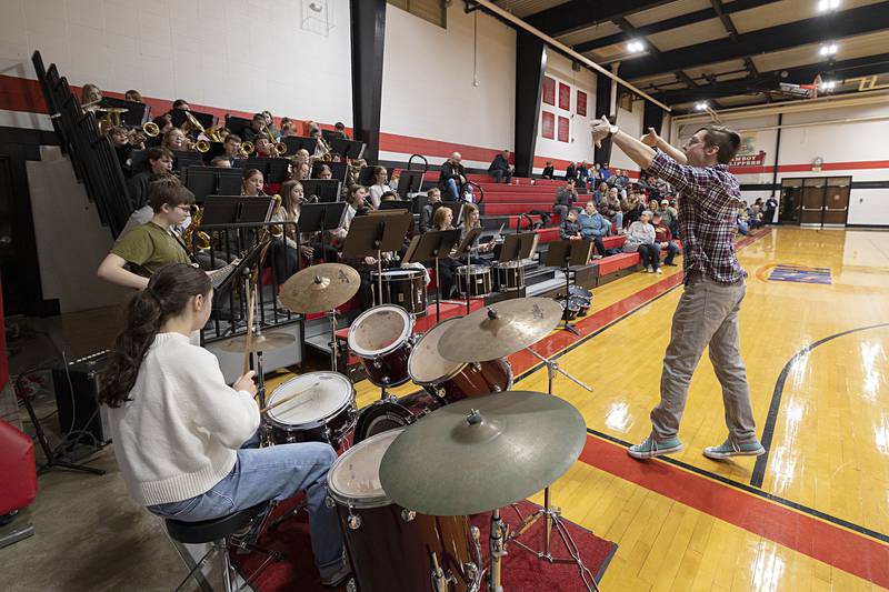Avery Kerley leads his Amboy Junior High School Pep Band Tuesday, Feb. 3, 2026, during their half time performance.