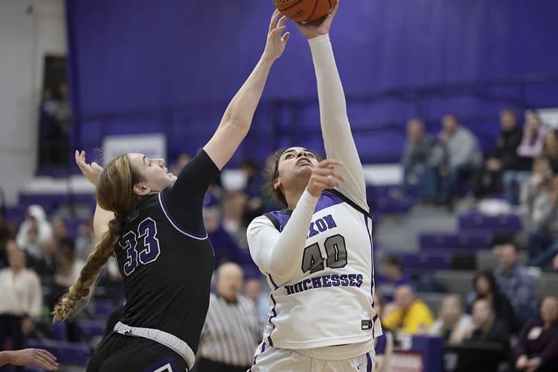 Dixon’s Hallie Williamson puts up a shot against against Rockford Lutheran’s Hannah Morgan Friday, Jan. 13, 2023.